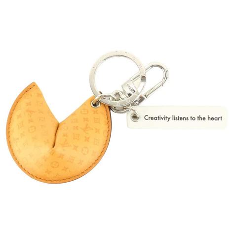 louis vuitton cookie bag charm.